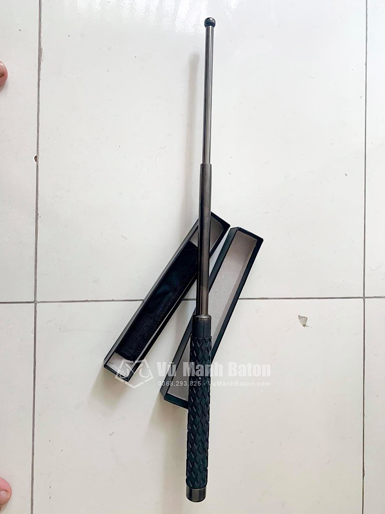 Ban Tran Nguyen Dat (Quan 1, TpHCM) mua baton ASP 5.11 mau den Army